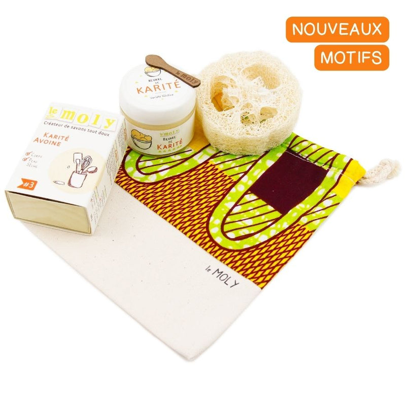 Coffret cadeau peau sèche avec du beurre de karité bio Nilotica, du savon à froid avoine karité et un porte-savon en loofah